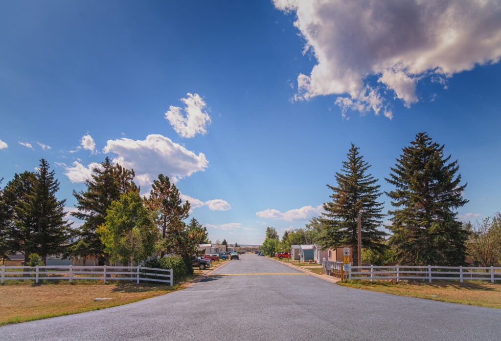 Manufactured home neighborhood with tree-lined streets