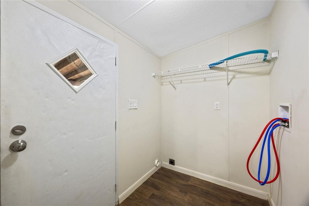 Inside utility room with washer and dryer connections