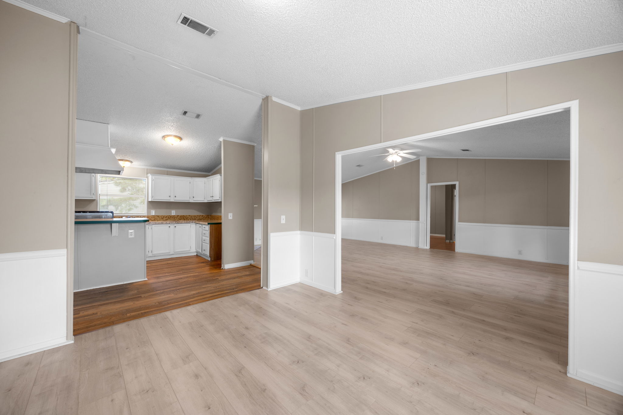View from the living room through to the kitchen. 14279 Shadow Bay Dr, Willis TX
