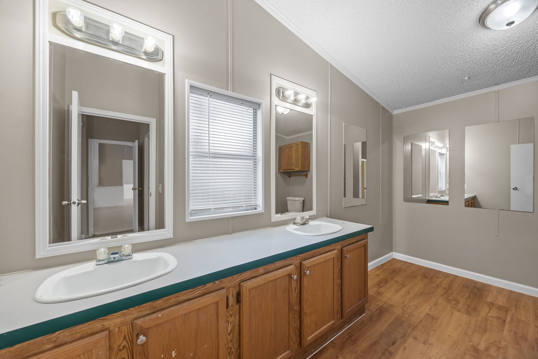 Primary bath with double vanity. 14279 Shadow Bay Dr, Willis TX