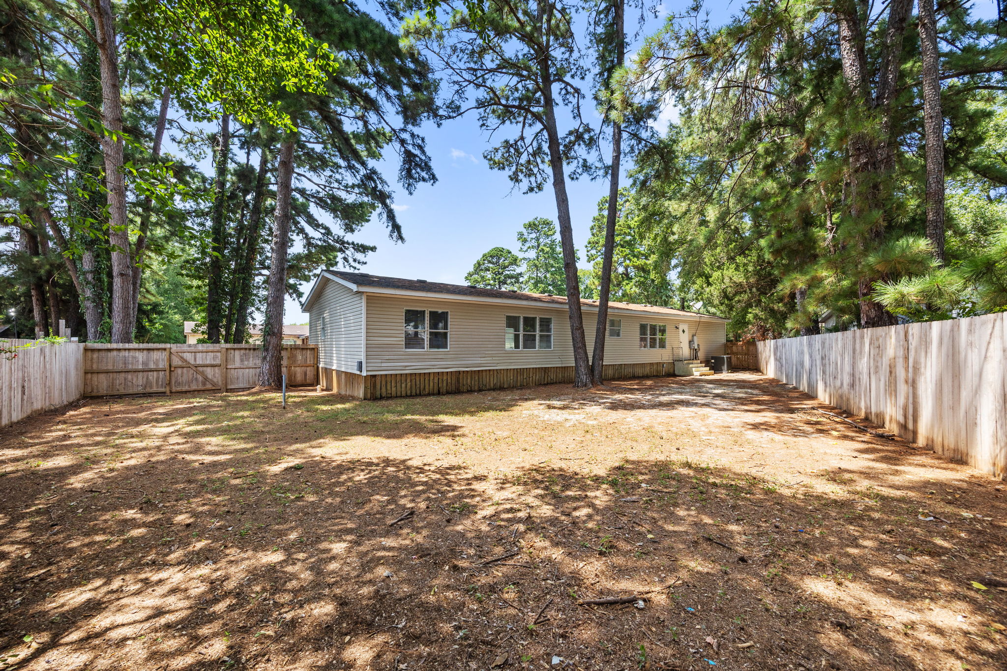Rear of the home from the back of the lot. 14279 Shadow Bay Dr, Willis TX