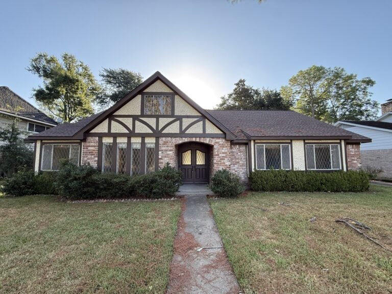 2830 Shadowdale Dr Houston TX front exterior with Tudor-style brick and half-timber facade