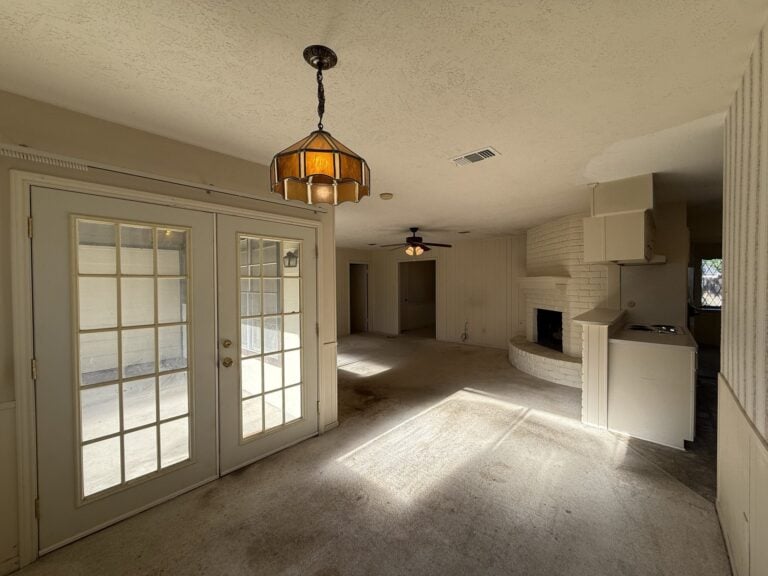 2830 Shadowdale Dr Houston TX family room with French doors to the covered patio