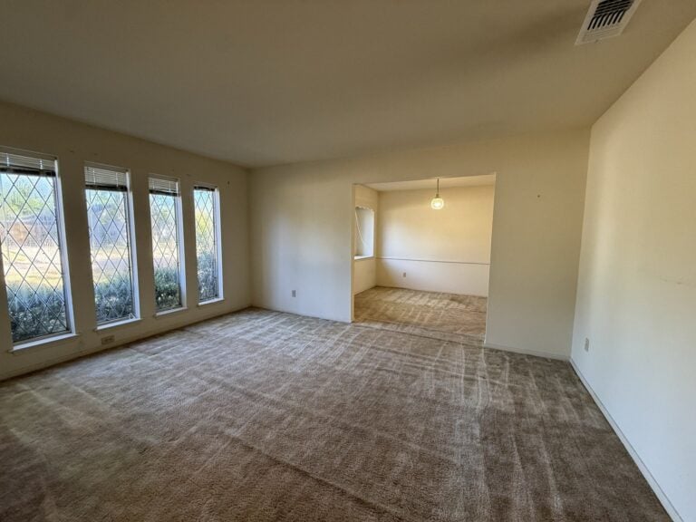 2830 Shadowdale Dr Houston TX formal living and dining with wall of windows