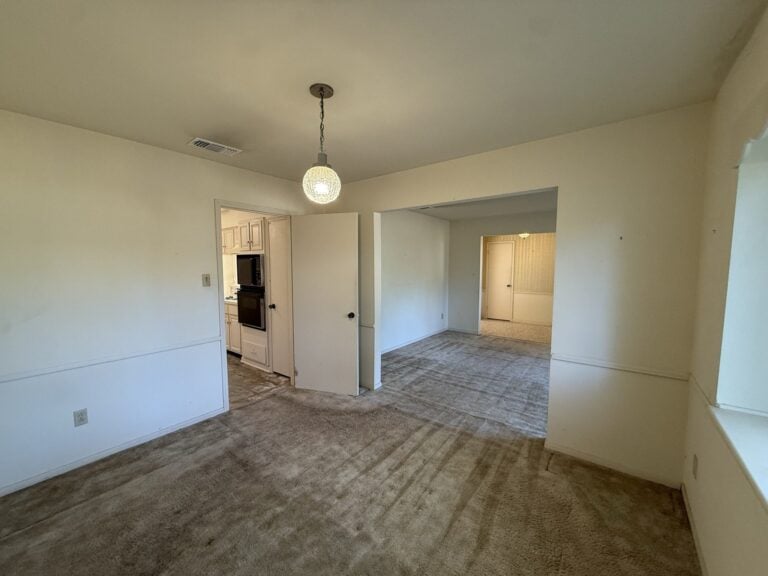 2830 Shadowdale Dr Houston TX formal living room toward the bedroom hall