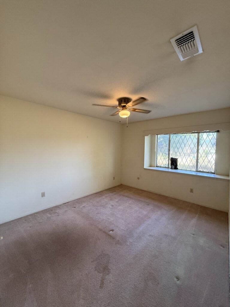 2830 Shadowdale Dr Houston TX bedroom with ceiling fan and window