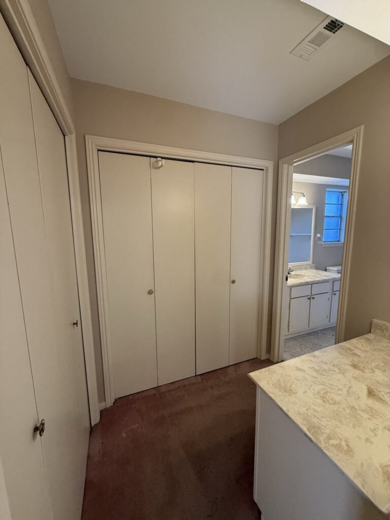 2830 Shadowdale Dr Houston TX hallway with built-in storage closets