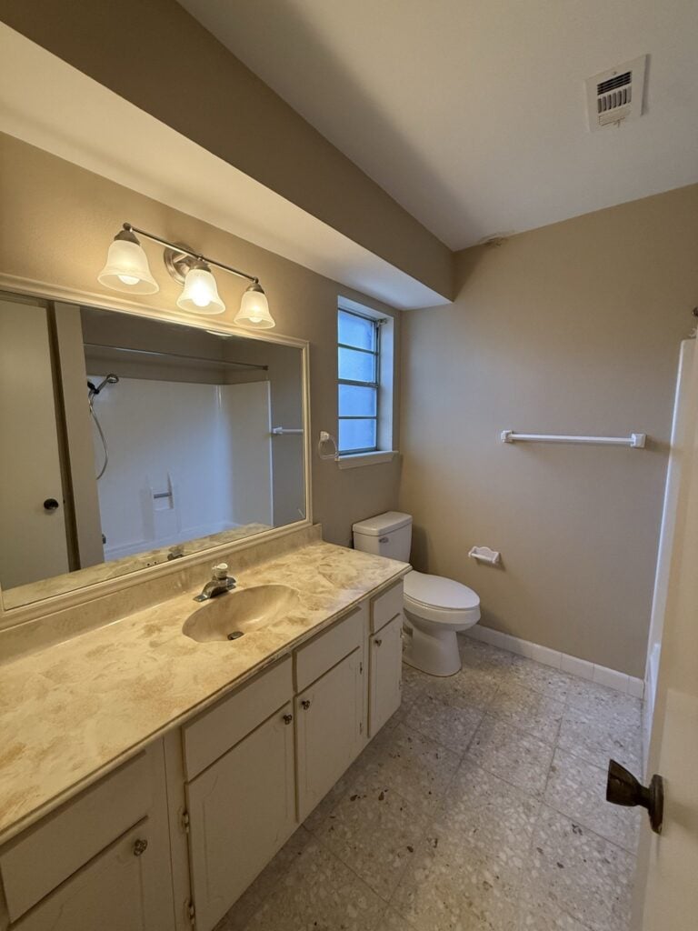 2830 Shadowdale Dr Houston TX bathroom with tub-shower and vanity