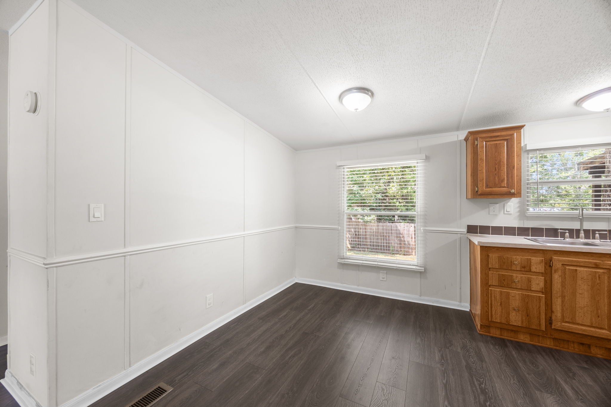 9642 Live Oak Trl Willis TX - Dining space with natural light and new flooring